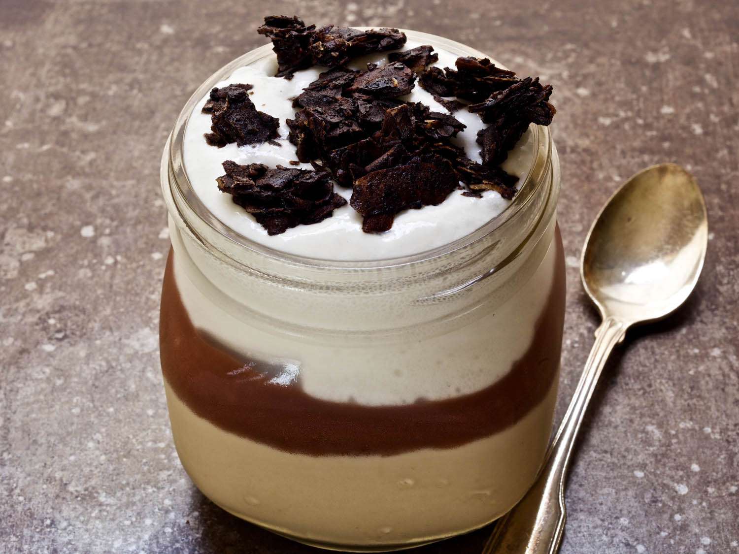 Layered Toasted-Coconut Puddings With Red Fruit Purée and Coconut Cream Recipe Image