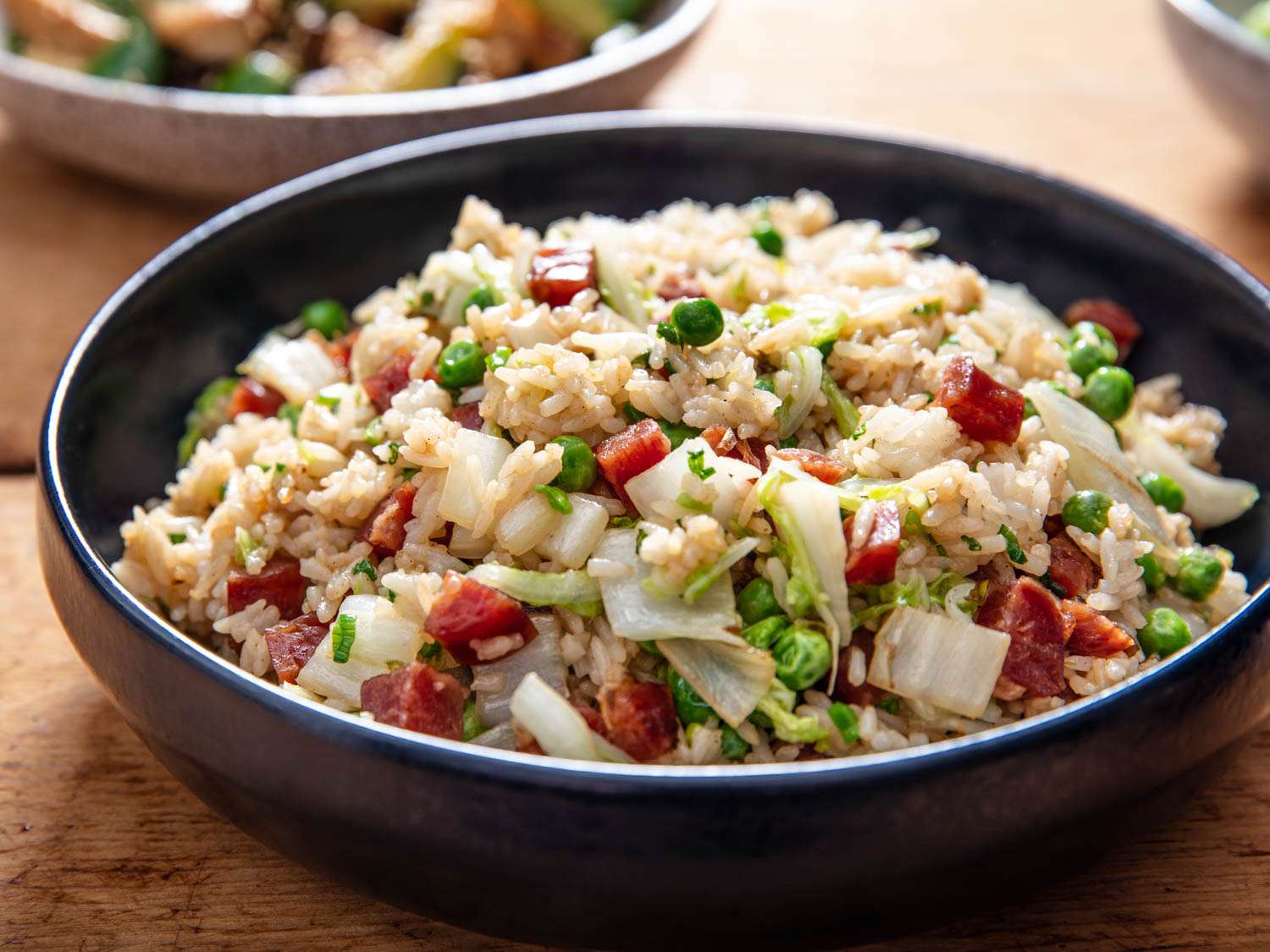 Fried Rice With Chinese Sausage, Cabbage, and Torch <em>Hei</em> Recipe Image