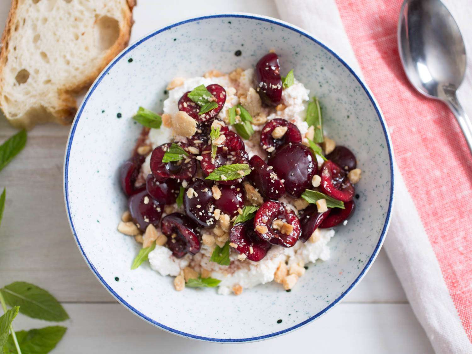 Sweet-Sour Macerated Cherries With Marcona Almonds, Mint, and Ricotta Recipe Image