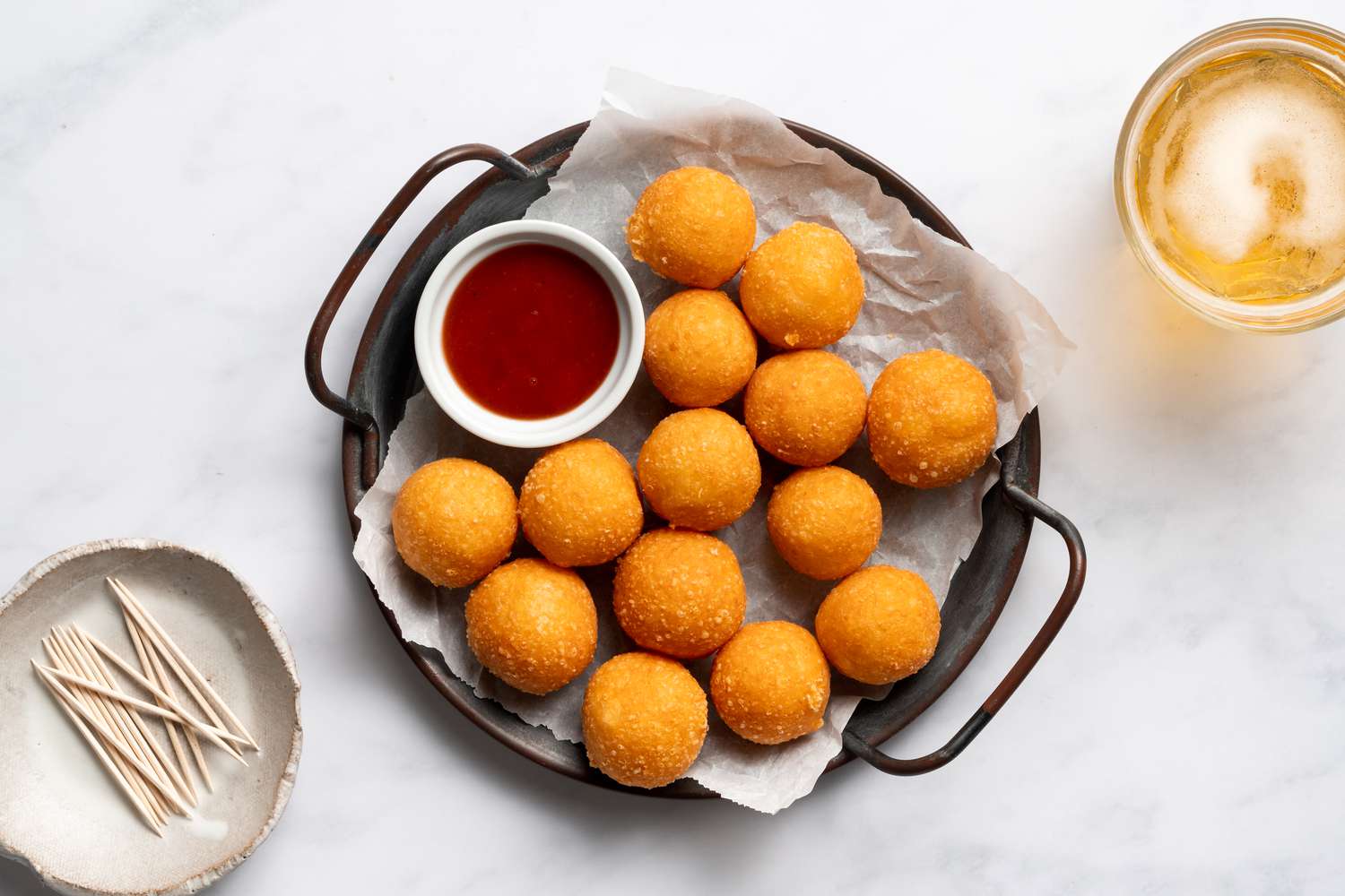 A Recipe for Fried Cheese Balls With Guava Dipping Sauce Image
